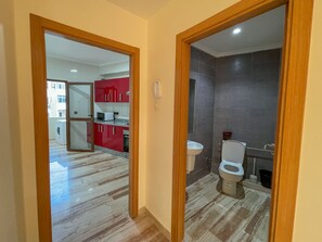 Apartamento, 2 quartos | Cozinha privada | Geladeira, fogão, cooktop, talheres/pratos/utensílios de cozinha