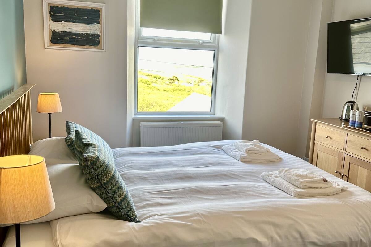 basic double room | hypo-allergenic bedding, down duvets, blackout curtains