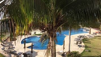 Outdoor pool, open 9:00 AM to 10:00 PM, pool umbrellas, pool loungers