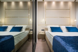 Deluxe kamer, 1 twee- of 2 eenpersoonsbedden | Lakens van Egyptisch katoen, luxe beddengoed