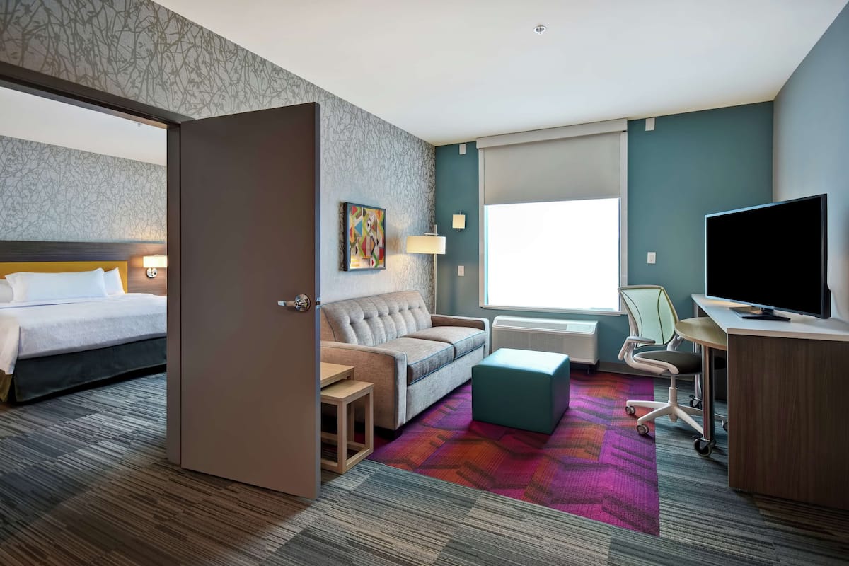 Suite, 1 King Bed, Accessible (Mobility & Hearing, Roll-in Shower) | In-room safe, desk, blackout drapes, soundproofing