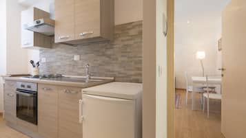 Comfort Apartment, 1 Bedroom, City View | Private kitchen | Fridge, oven, stovetop, espresso maker