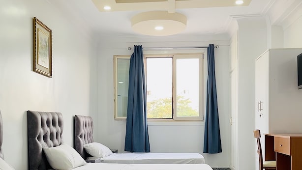 Classic Triple Room, 3 Twin Beds | Minibar, desk, laptop workspace, blackout drapes - Hostel light (Algiers)