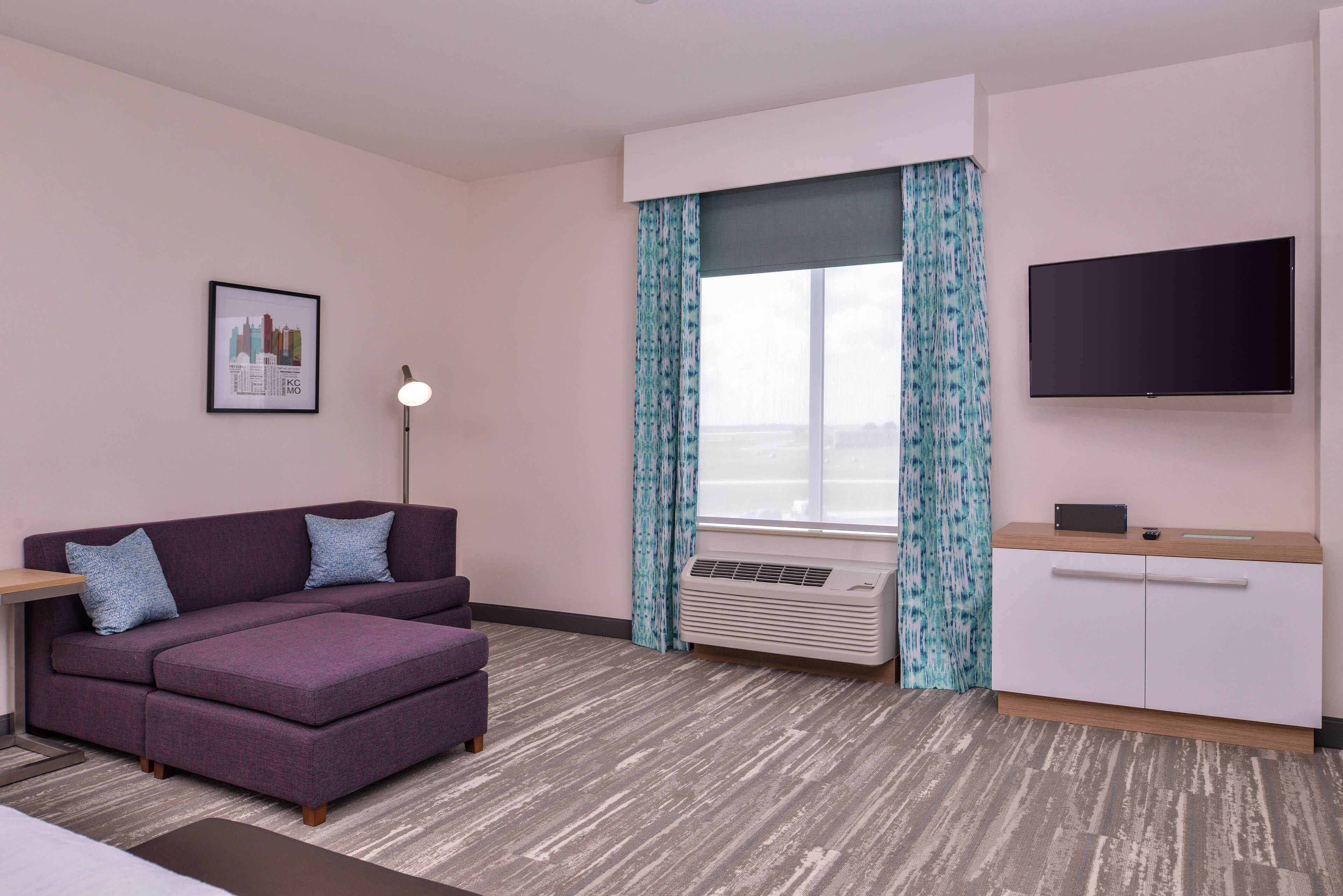 minibar, desk, blackout curtains, iron/ironing board