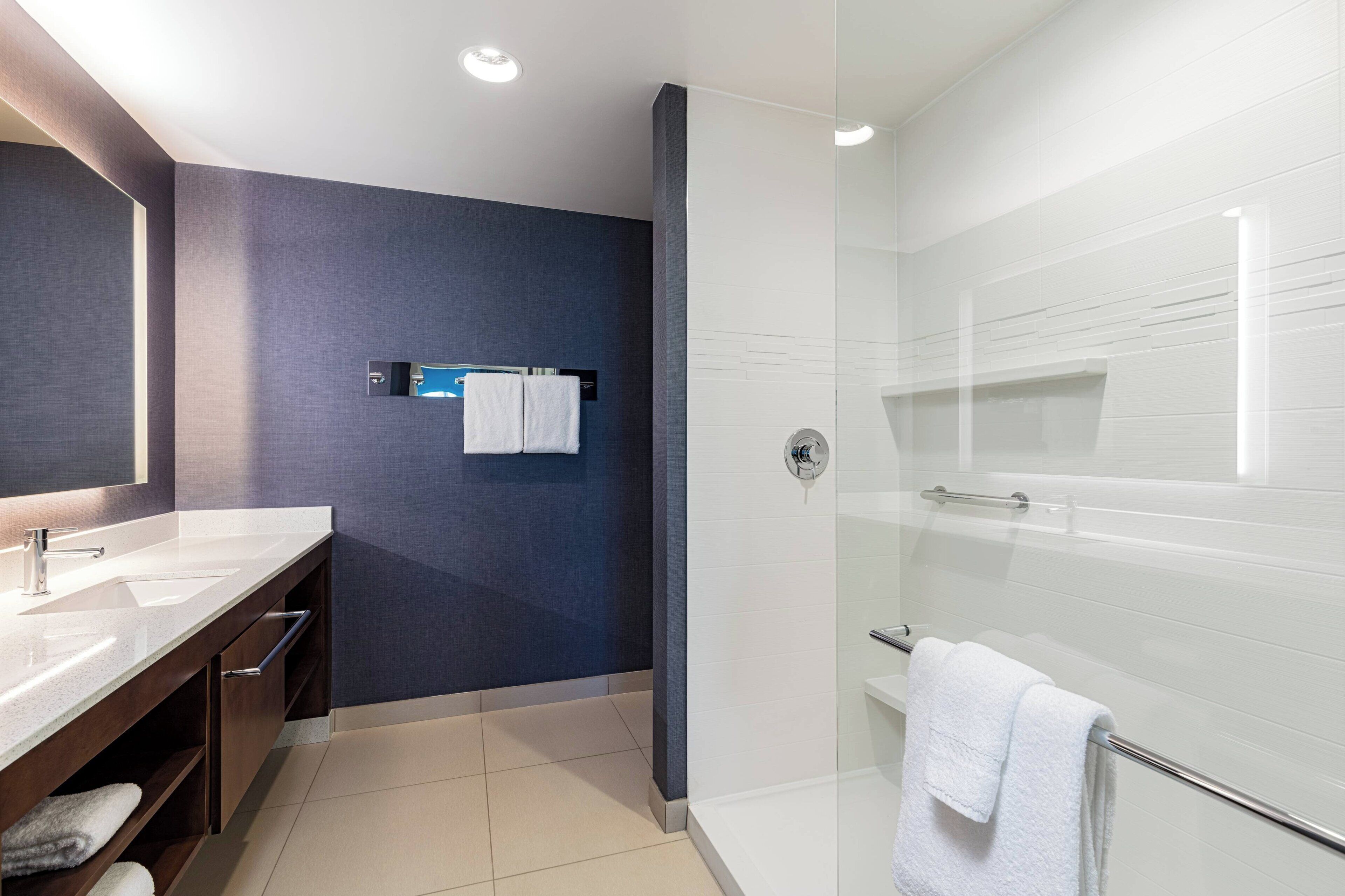 separate bathtub and shower, free toiletries, hair dryer, towels