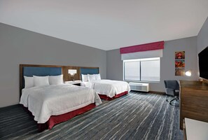A hotel room with two beds, a desk, a chair, and a large window. - Hampton Inn Weslaco (Weslaco)
