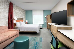 Escritorio, espacio para trabajar con laptop y cortinas blackout 