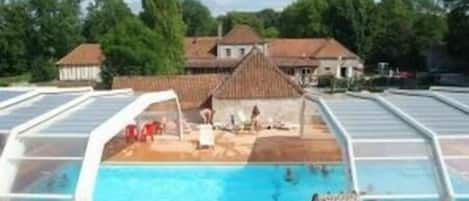 Seasonal outdoor pool, pool umbrellas, pool loungers