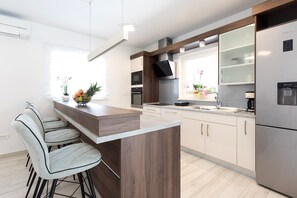 Deluxe Villa, 3 Bedrooms | Private kitchen | Full-sized fridge, microwave, oven, stovetop - Beautiful Villa Magdalena - Porat (Malinska-Dubasnica)