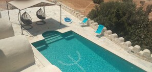 Alberca al aire libre por temporada