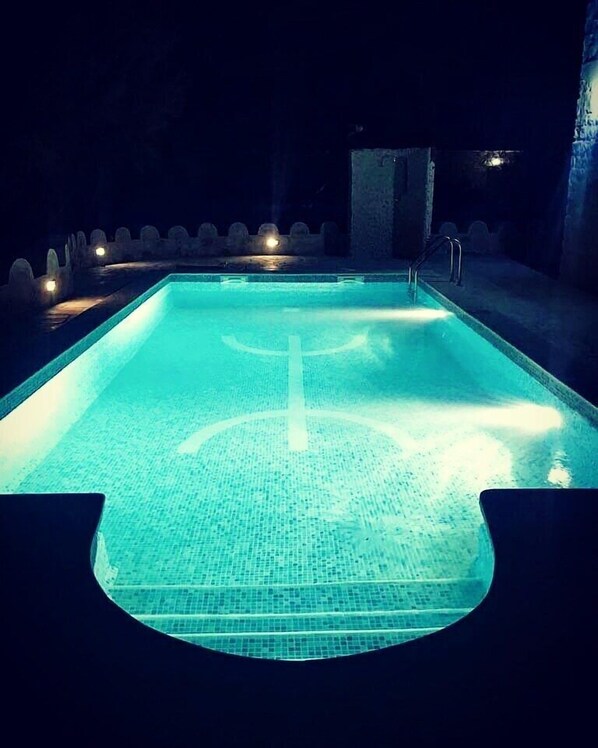 Alberca al aire libre por temporada