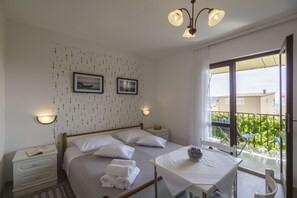 4 dormitorios, escritorio, tabla de planchar con plancha y Internet