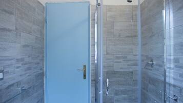 Shower, hair dryer, bidet, toilet paper