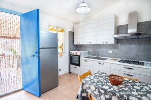 Fridge, dishwasher, cookware/dishes/utensils