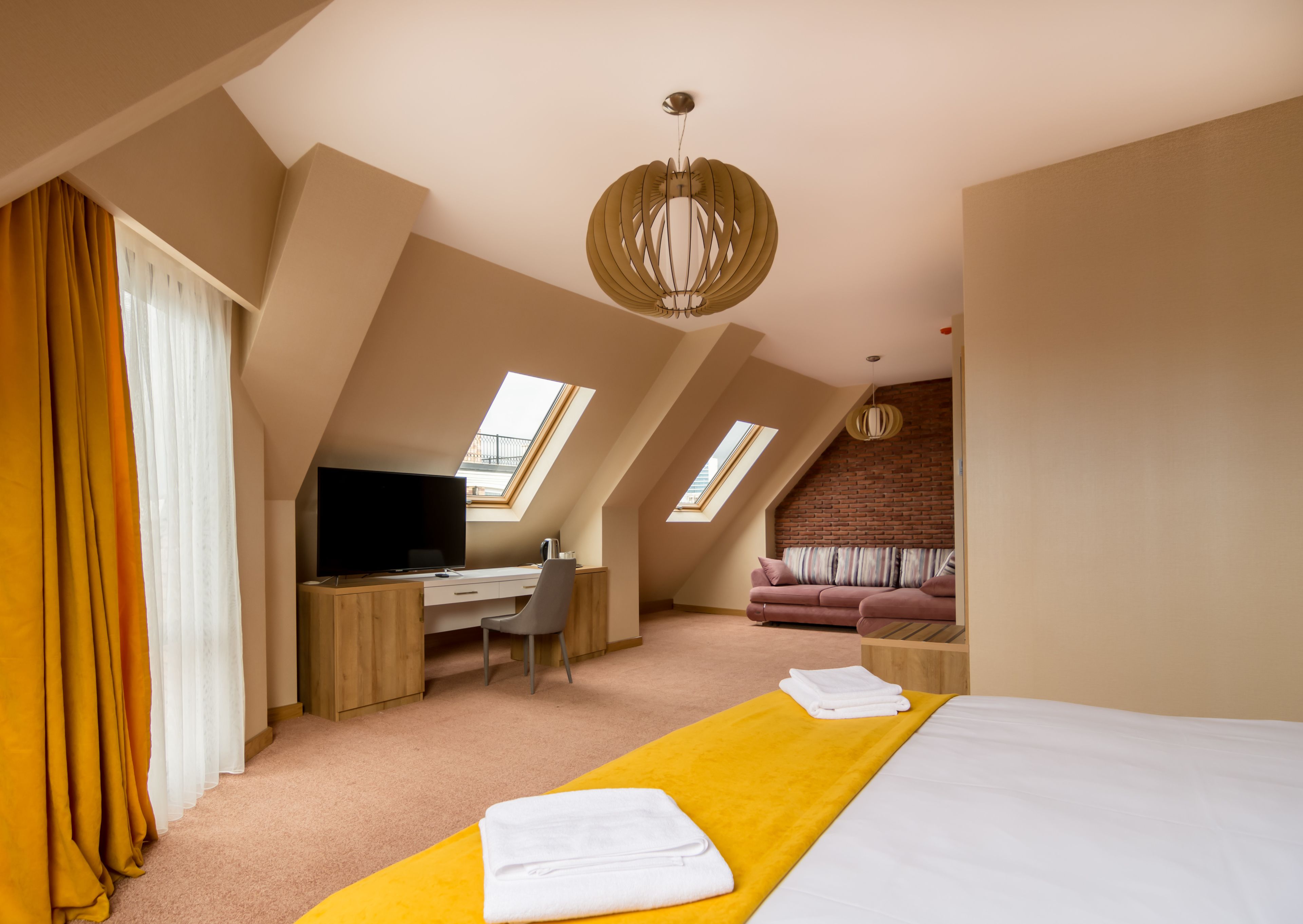 suite, city view | living area | led tv