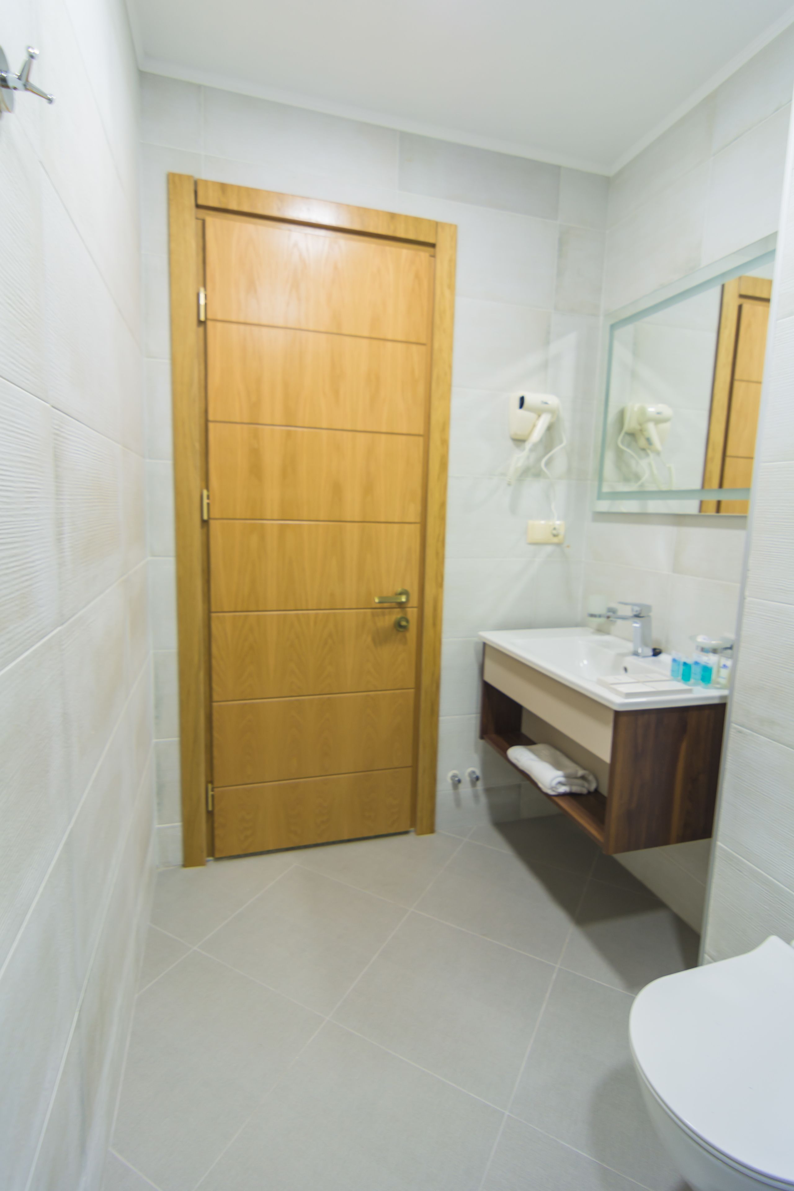 twin room (with extra bed) | bathroom | free toiletries, hair dryer, dressing gowns, slippers