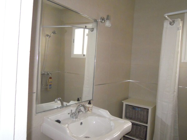Hair dryer, towels, soap, shampoo