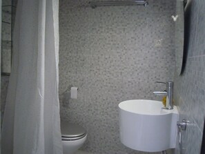 Hair dryer, towels, soap, shampoo