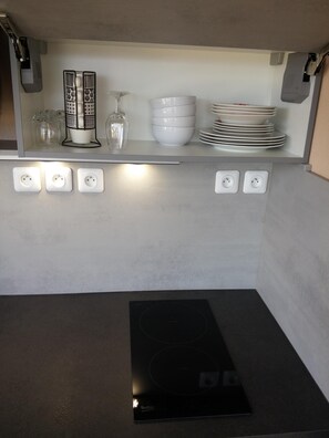 Fridge, microwave, stovetop, coffee/tea maker