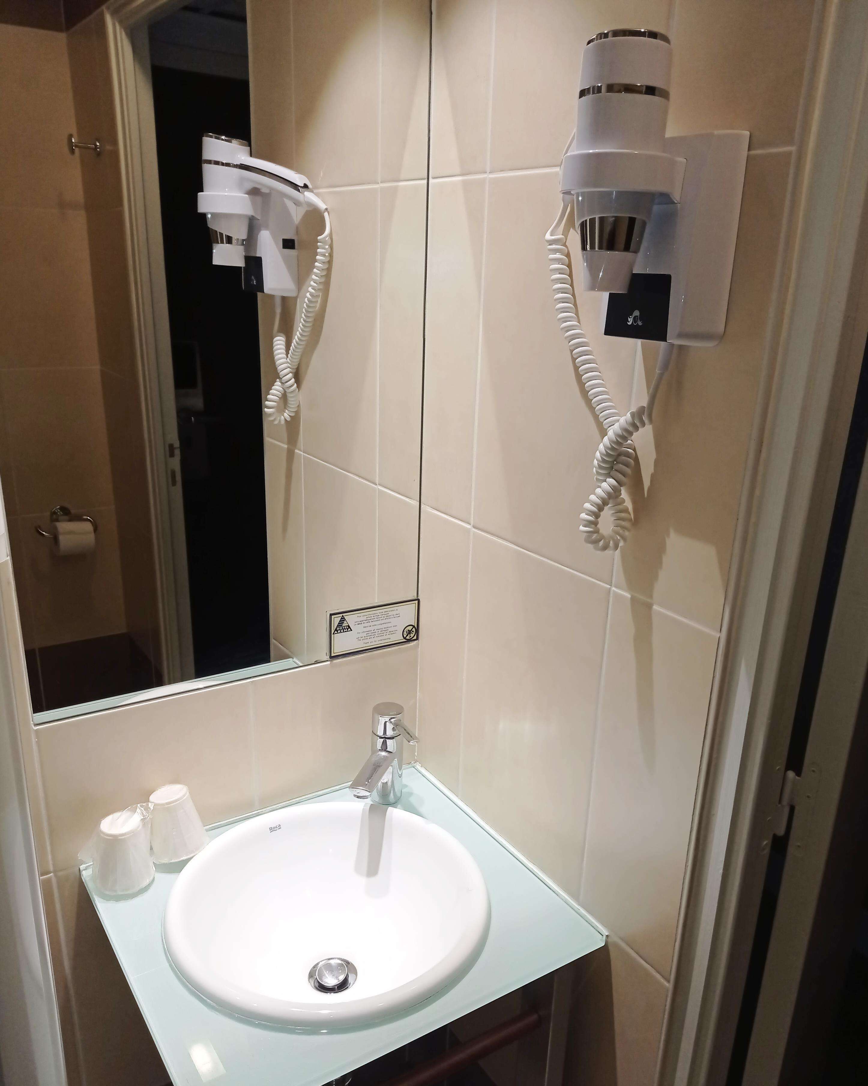 eco-friendly toiletries, hair dryer, towels