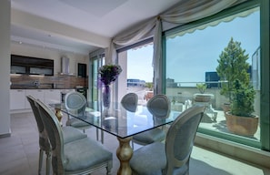 Apartment, Sea View | In-room dining