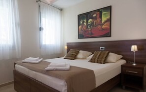 Iron/ironing board, free cots/infant beds, free WiFi, bed sheets