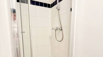 Shower, towels, soap, shampoo