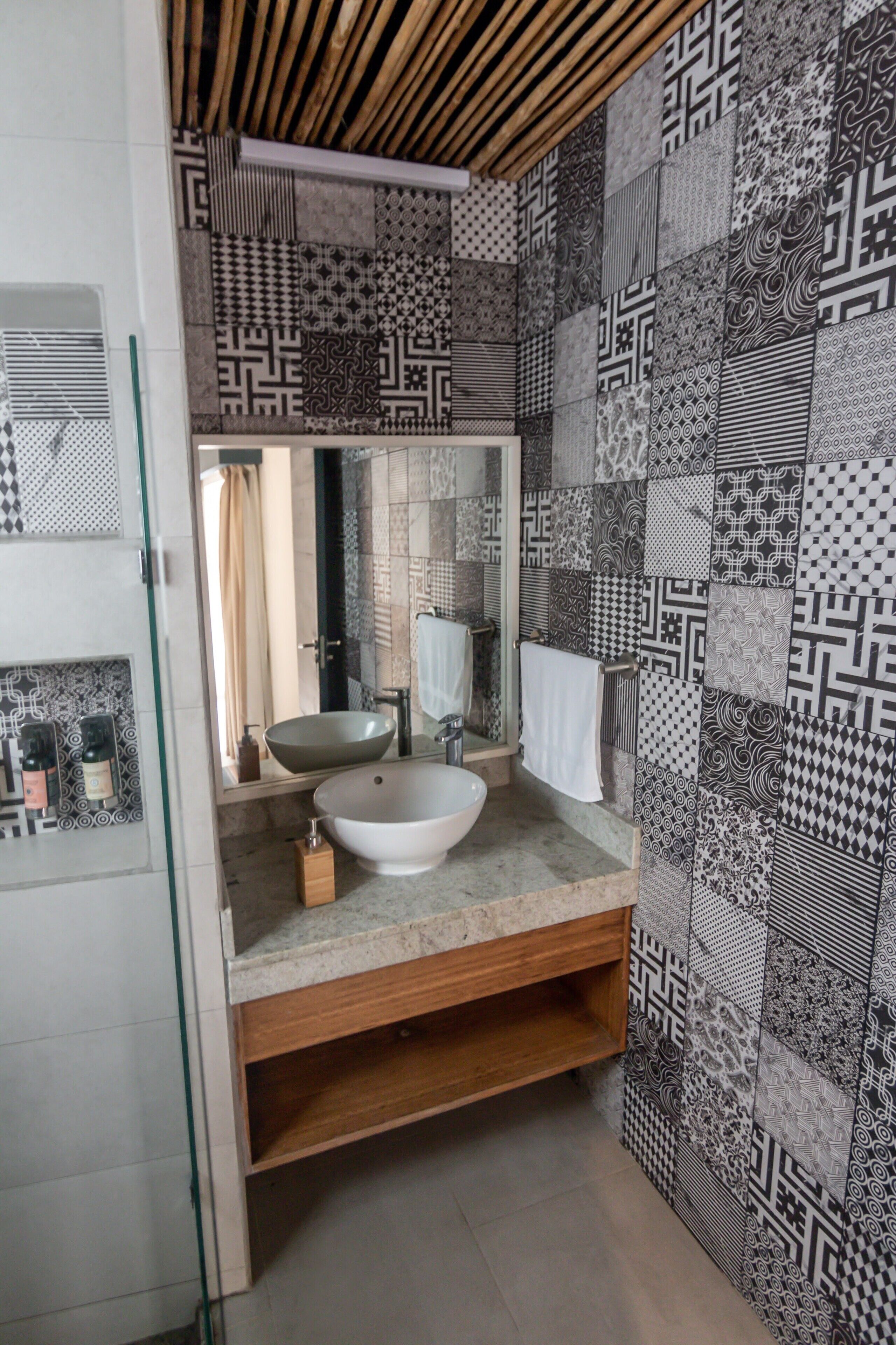 shower, rainfall showerhead, eco-friendly toiletries, towels