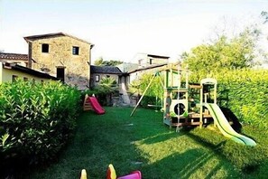 Children's area - Villa Pavone E: A graceful apartment that covers the entire first floor of a villa surrounded by the greenery, with Free WI-FI. (Montone)