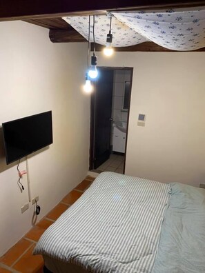Chambre quadruple | Literie de qualité, lit de bébé (supplément), lit d’appoint (supplément)