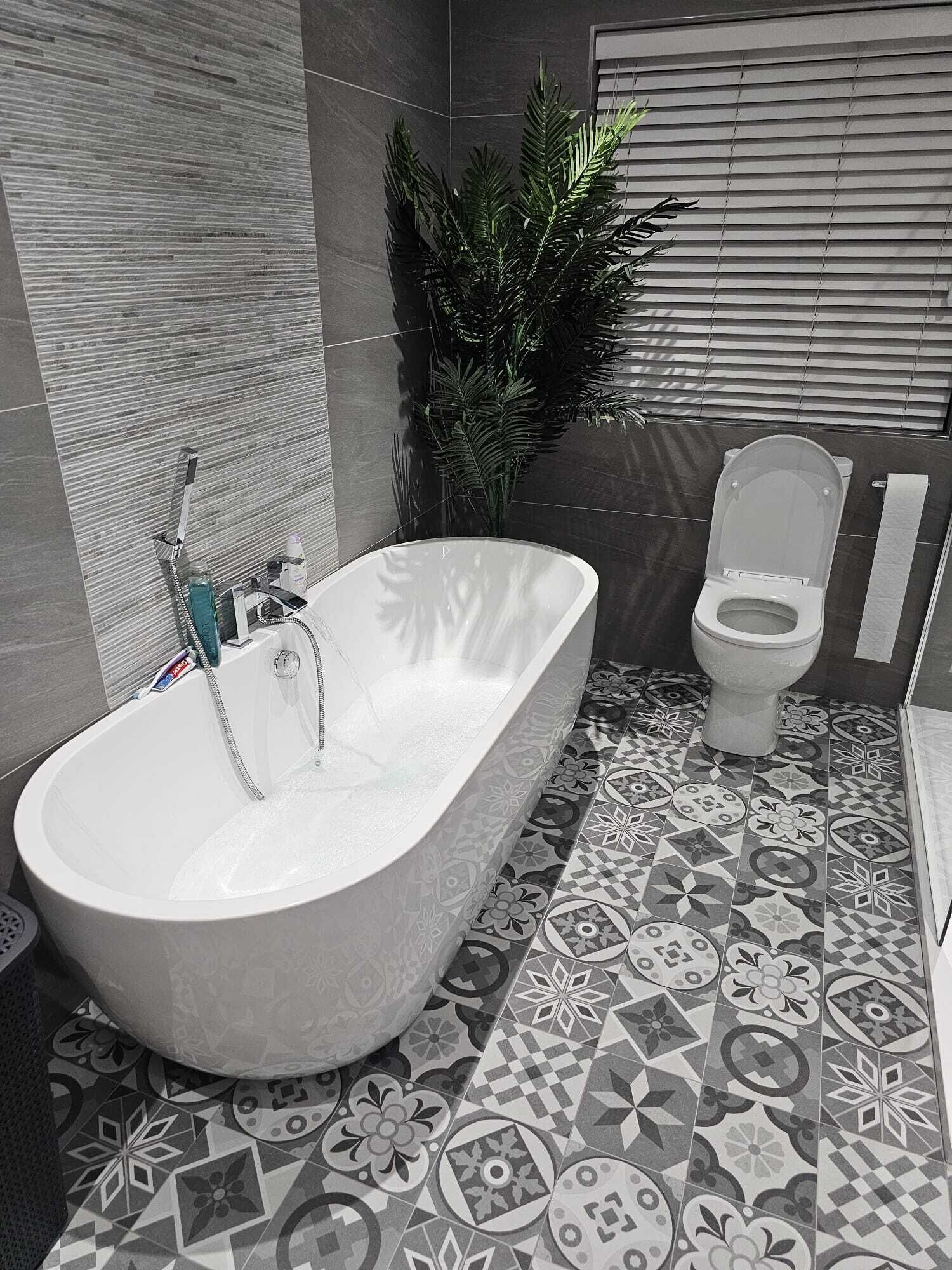 Combined shower/tub, hair dryer, towels, soap