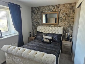 4 bedrooms, iron/ironing board, travel cot, WiFi