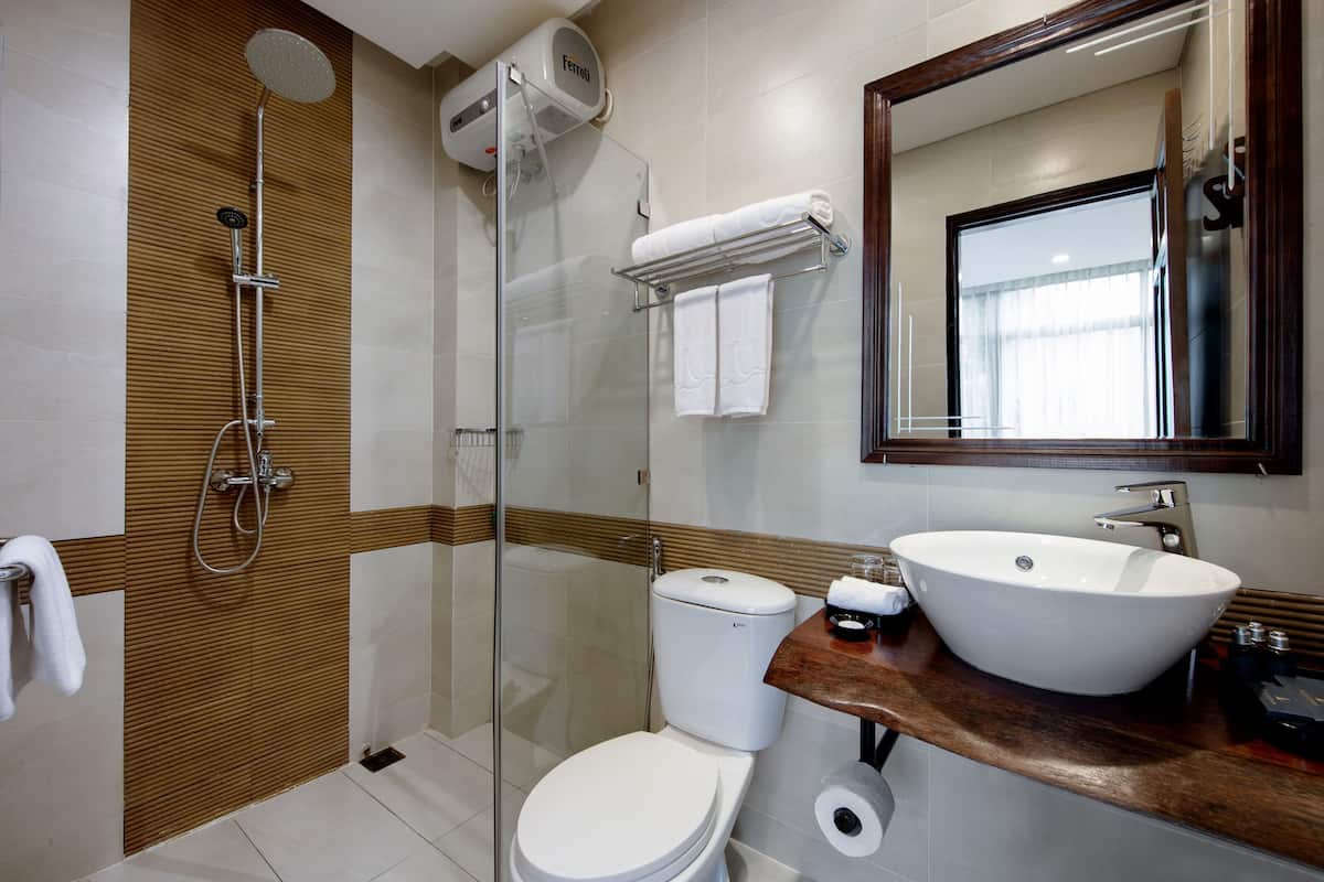 classic garden view | bathroom | designer toiletries, hair dryer, bathrobes, slippers