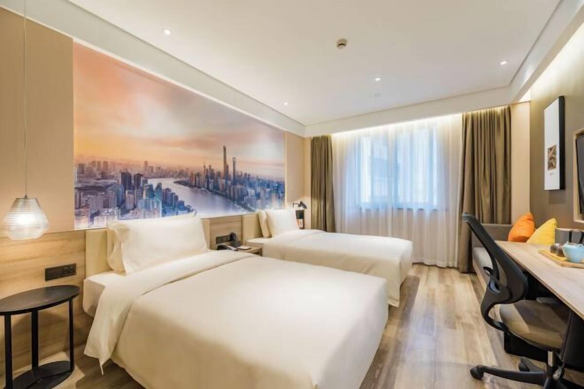 Premium bedding, down duvets, memory-foam beds, desk