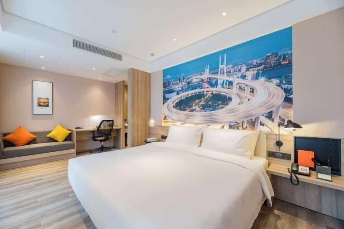 Premium bedding, down duvets, memory-foam beds, desk