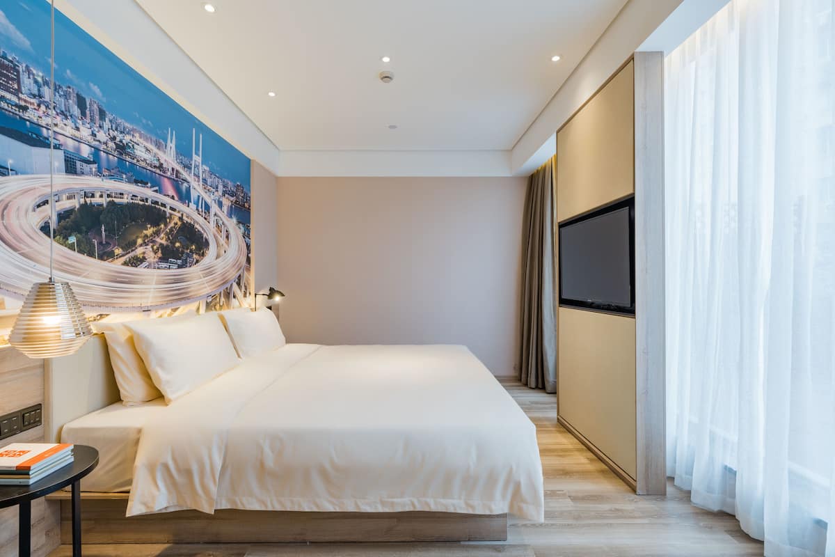 Premium bedding, down duvets, memory-foam beds, desk