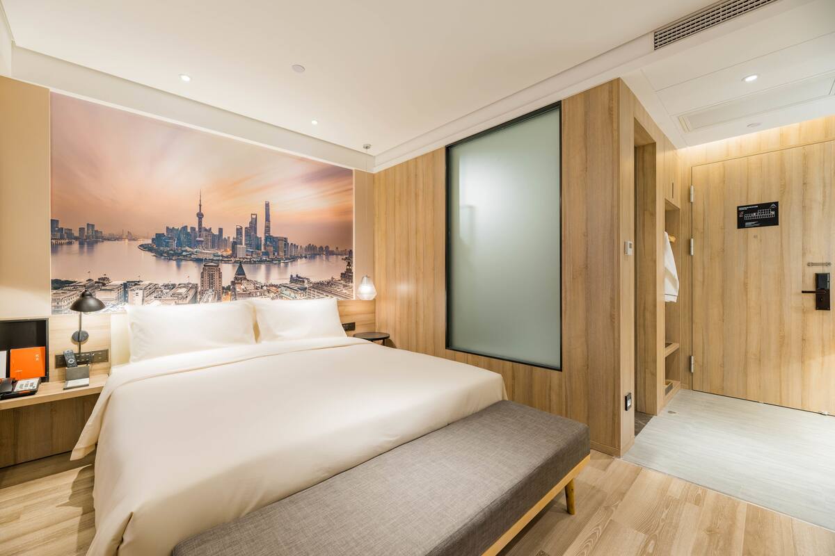 Premium bedding, down duvets, memory-foam beds, desk