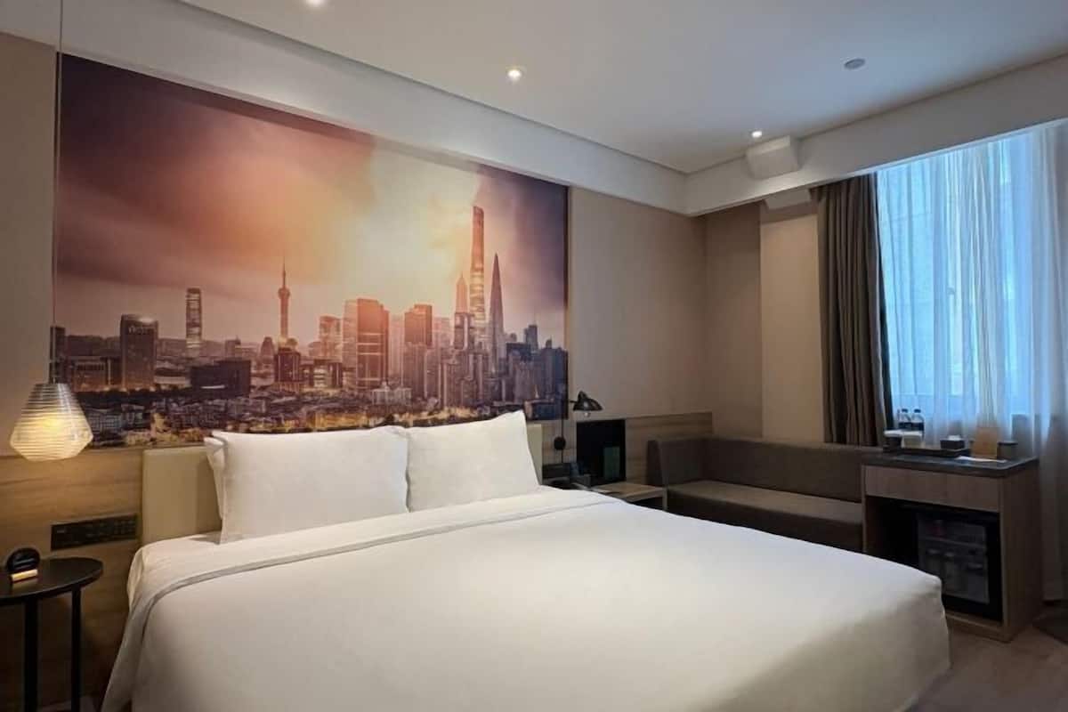 Premium bedding, down duvets, memory-foam beds, desk