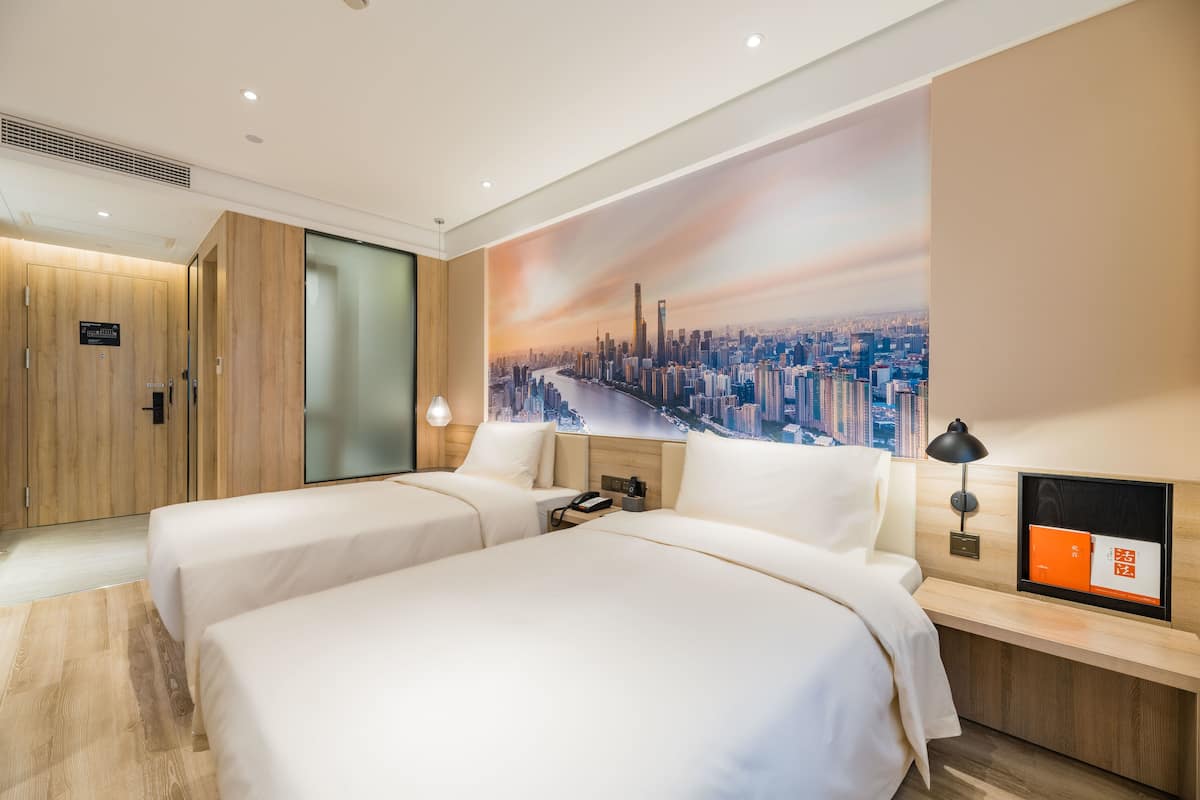 Premium bedding, down duvets, memory-foam beds, desk