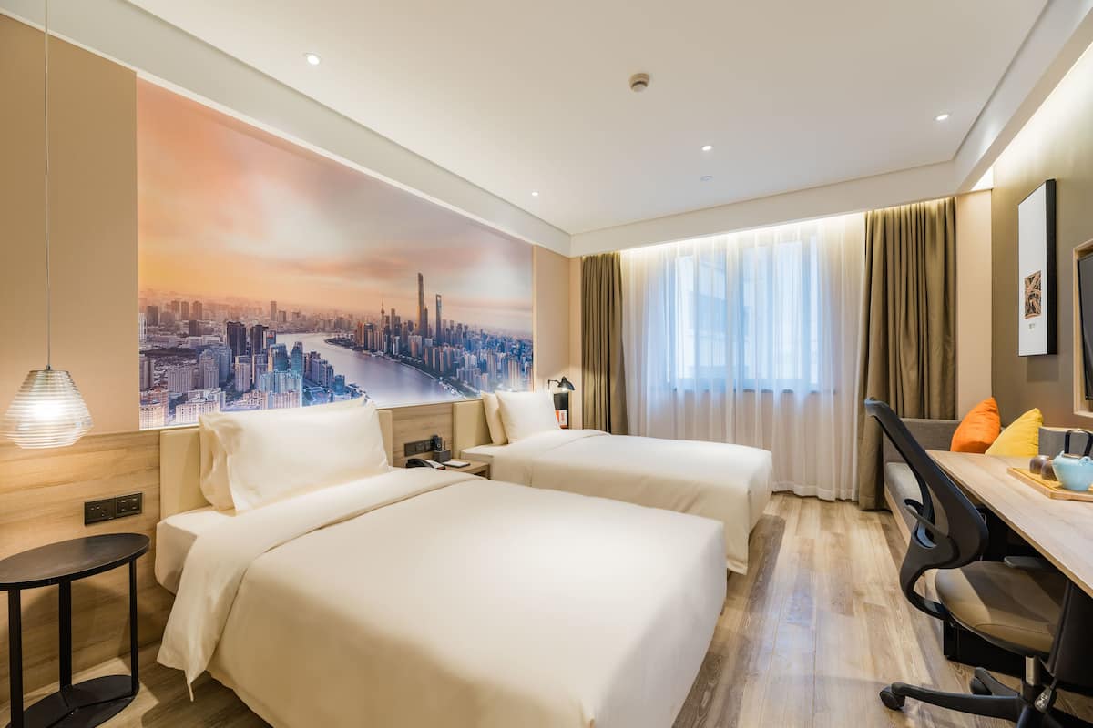 Premium bedding, down duvets, memory-foam beds, desk