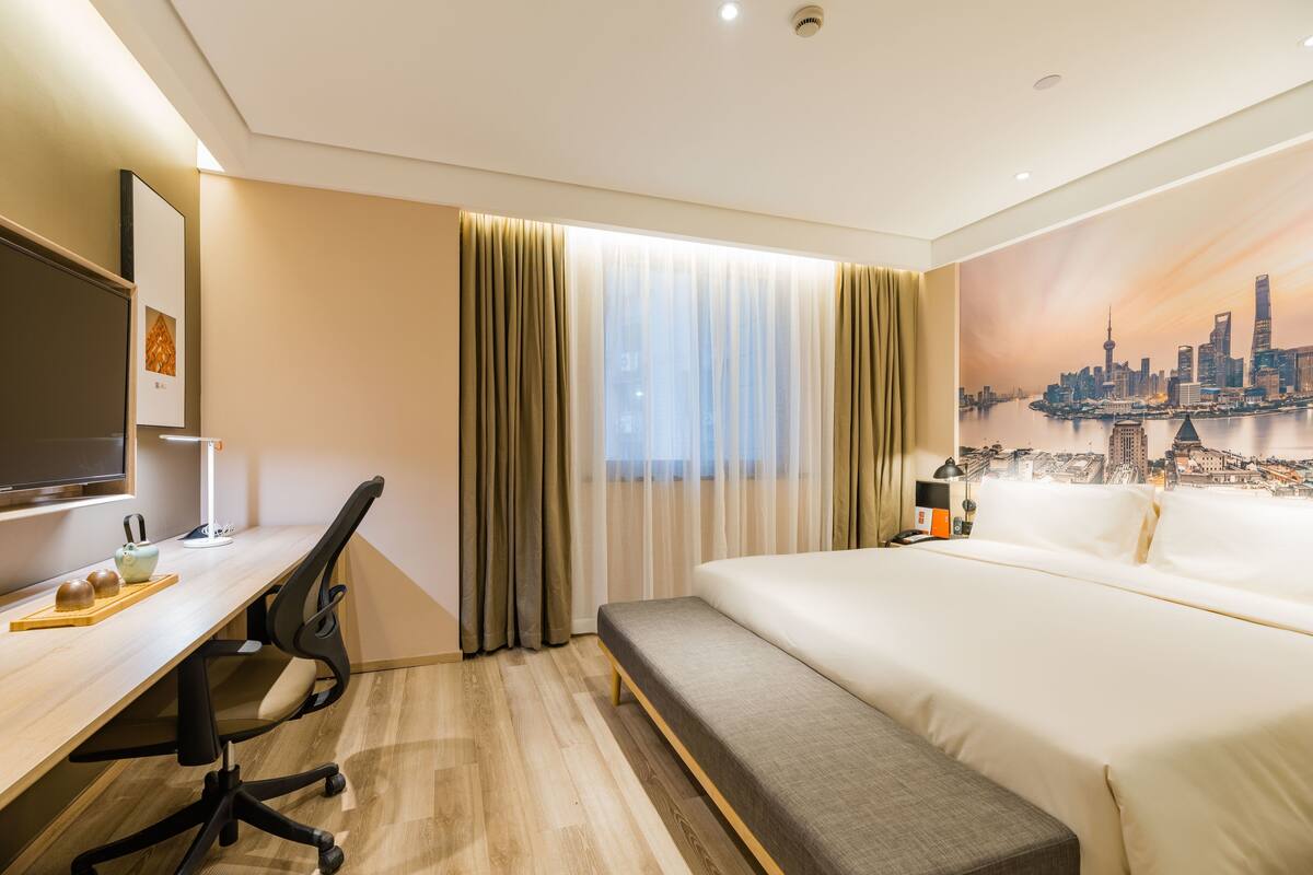 Premium bedding, down duvets, memory-foam beds, desk