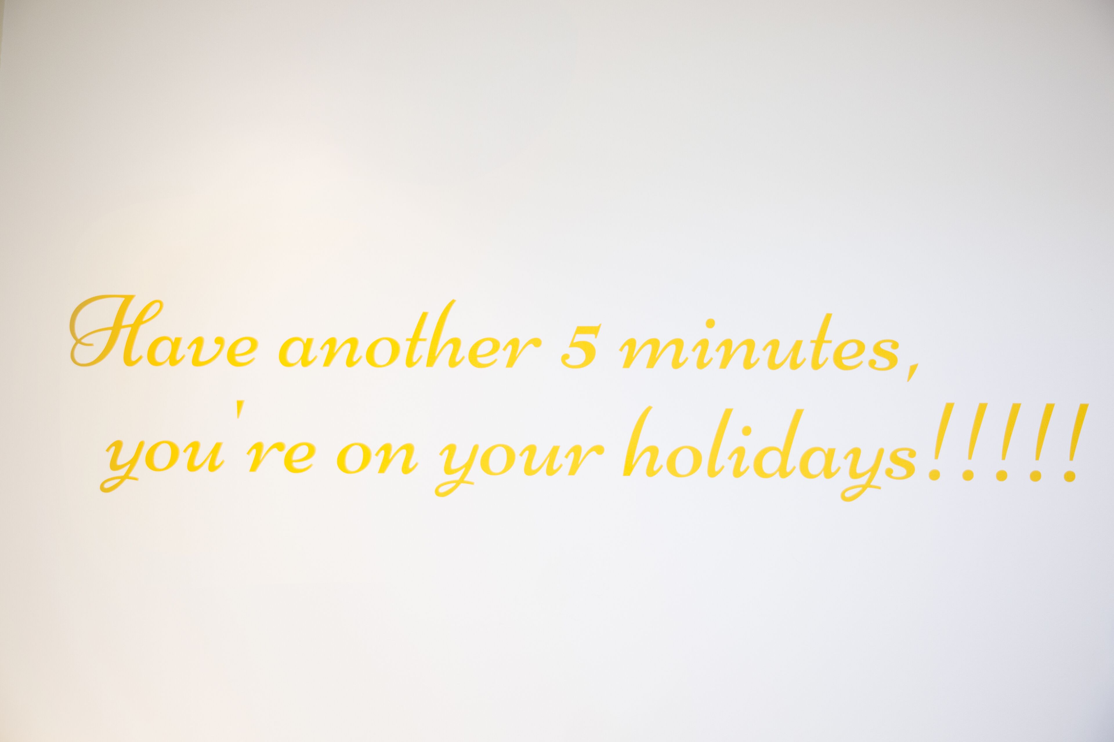 A text message in yellow font on a white background.