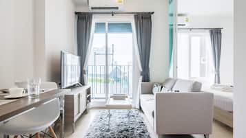 Standard Apartment, 1 Bedroom | Living area | Flat-screen TV
