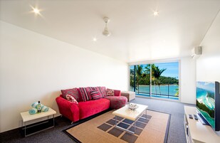 Panoramic Apartment, Ocean View | Living area | Flat-screen TV