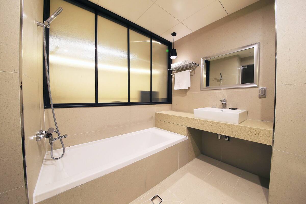 standard room | bathroom | hair dryer, bathrobes, towels, shampoo