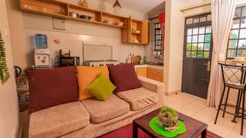 Appartement, 1 chambre | Coin séjour