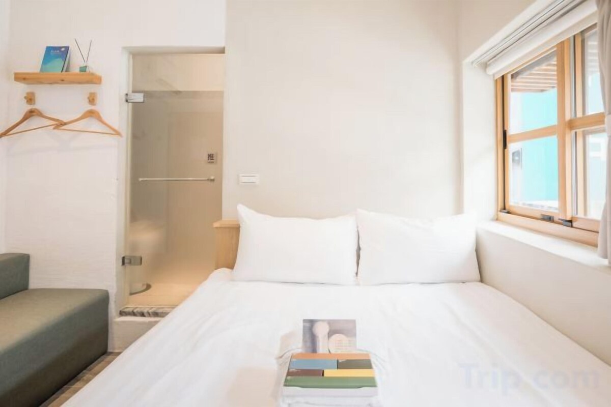 Blackout drapes, soundproofing, WiFi (free), bed sheets