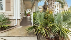 Stroll through lush gardens to the entrance of this traditional building.