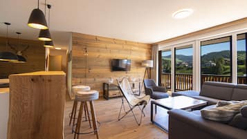 Superior Apartment, 3 Bedrooms, Valley View | Living area | Flat-screen TV, heated floors