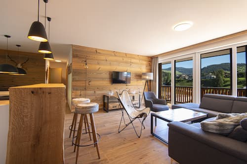 Superior Apartment, 3 Bedrooms, Valley View | Living area | Flat-screen TV, heated floors